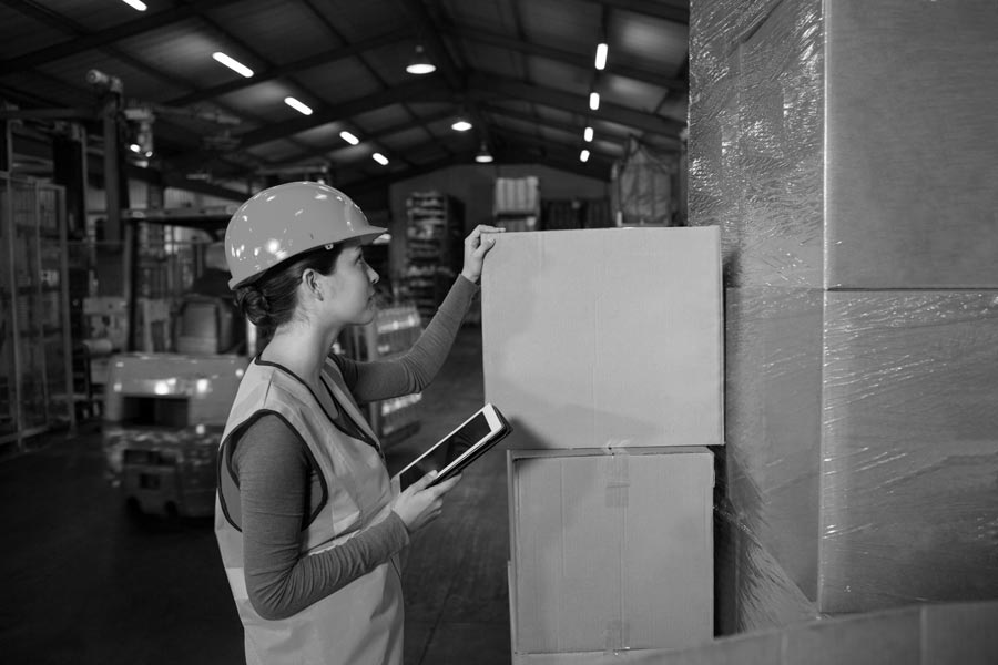 female-worker-working-warehouse---bw